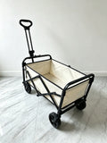 Chariot de transport pliant 90 x 50 x 95 cm en acier noir et tissu beige à quatre roues