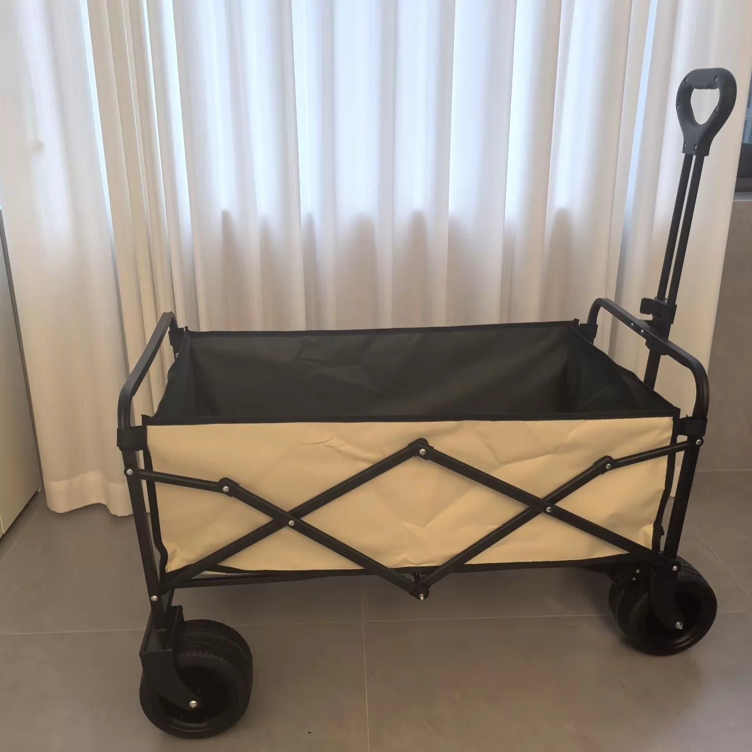 Chariot de jardin pliant 100 x 50 x 100 cm en acier noir et tissu beige avec roues tout-terrain